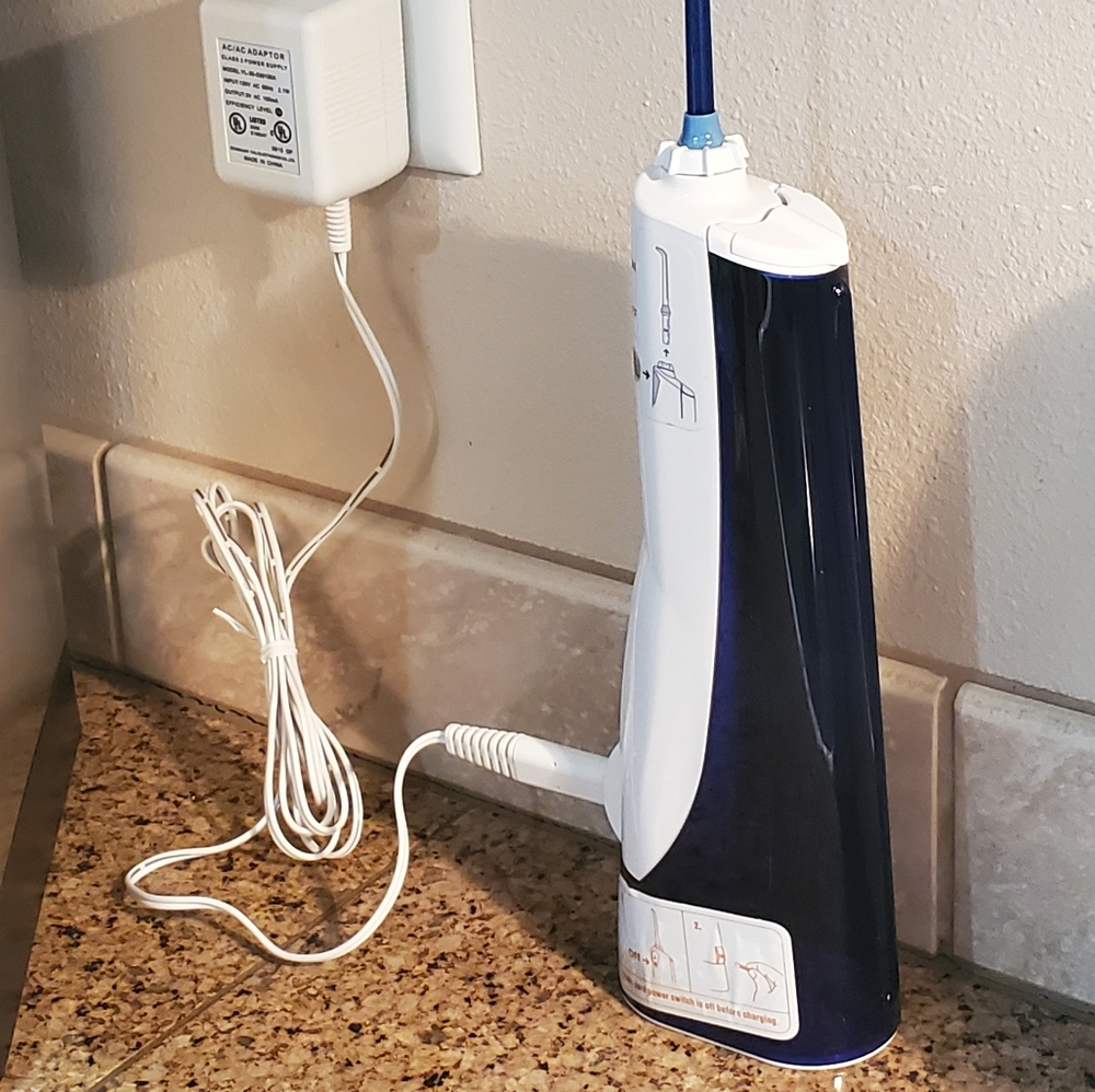 Water Pik Water Flosser, Like New Never Used.